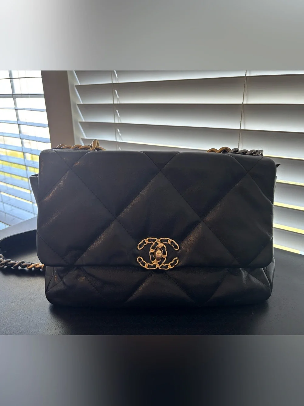 CHANEL Black Quilted Shoulder Bag with Gold Chain CC Emblem